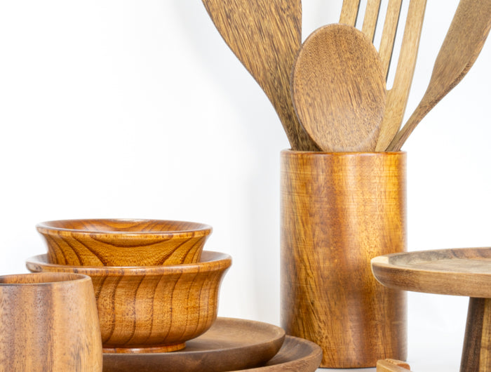 Wooden spoons, forks, plates, bowls, and kitchenware